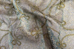 Organza fabric with embroidered lace design in gold color 110cm width