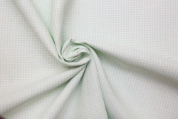 Plaid fabric in white and light green with a width of 140cm