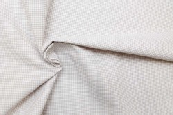 Plaid fabric in white and beige with a width of 140cm