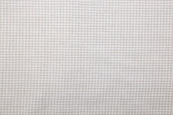 Plaid fabric in white and beige with a width of 140cm