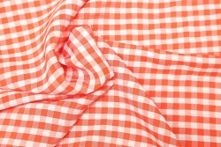 Plaid fabric in orange and white with a width of 150cm