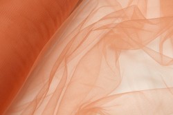 Soft tulle with a width of 160cm in orange color