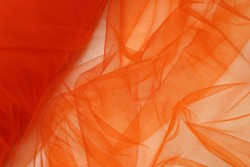 Soft tulle with a width of 160cm in dark orange color