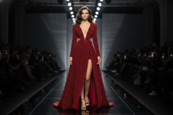 Βραδινό ύφασμα μαύρο ελαστικό ζέρσεϋ με κόκκινο γκλίτερ και φάρδος 150cm