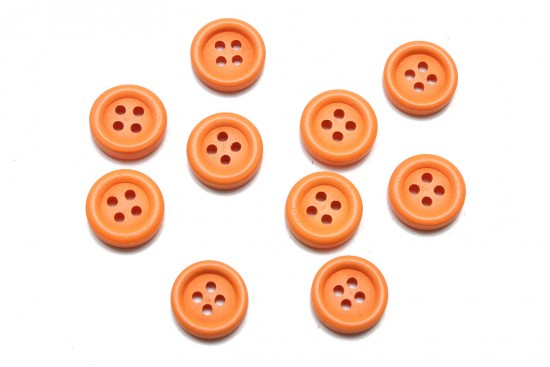 Wooden beads in the shape of a button and orange color