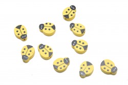 Wooden beads in the shape of a ladybug in black and yellow
