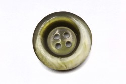 Κουμπί πράσινο στρογγυλό με τέσσερις τρύπες