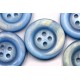 Κουμπί μπλε στρογγυλό με τέσσερις τρύπες